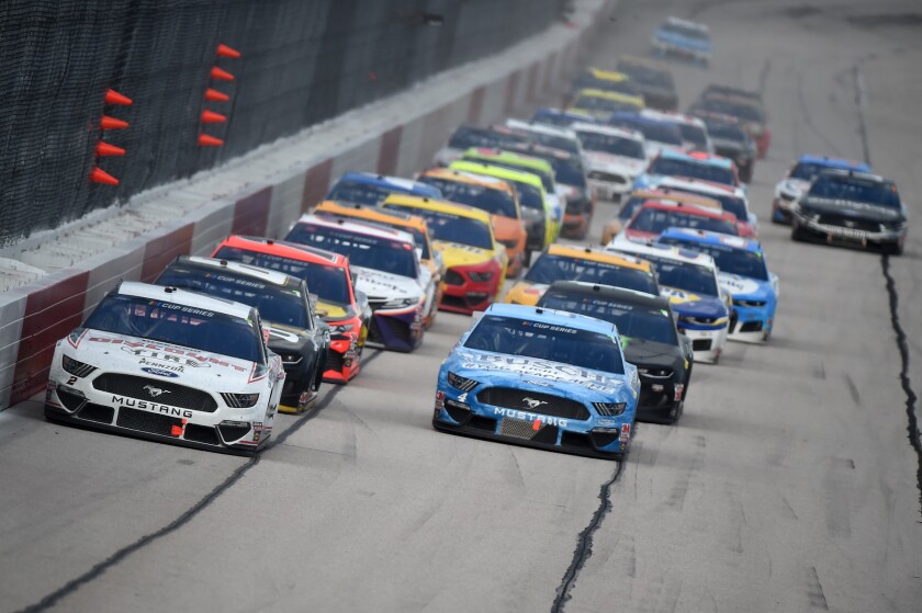 Brad Keselowski (#2) leads the pack
