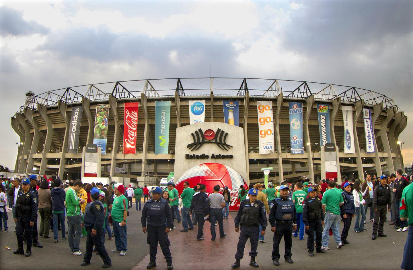 Fans attend a match between Mexico and the U.S. at the Azteca stadium in Mexico City on March 26, 2013.