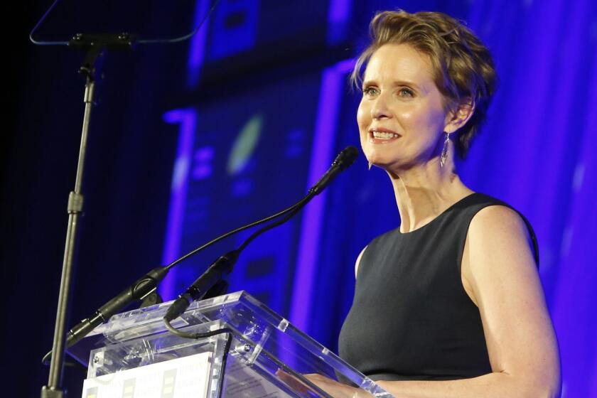 FILE - In this Feb. 3, 2018 file photo, Cynthia Nixon, former star of "Sex and the City," is honored by The Human Rights Campaign with an HRC Visibility Award in New York. Nixon said on Twitter Monday, March 19, 2018 that she'll challenge Gov. Andrew Cuomo in New York's Democratic primary in September. Her announcement sets up a race pitting an openly gay liberal activist against a two-term incumbent with a $30 million war chest and possible presidential ambitions. (Jason DeCrow/AP Images for Human Rights Campaign, File)