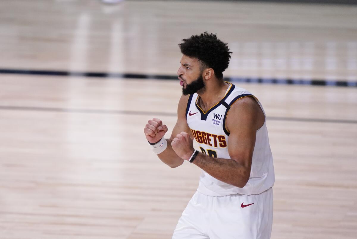 Guard Jamal Murray celebrates after a Nuggets basket against the Lakers during Game 2.