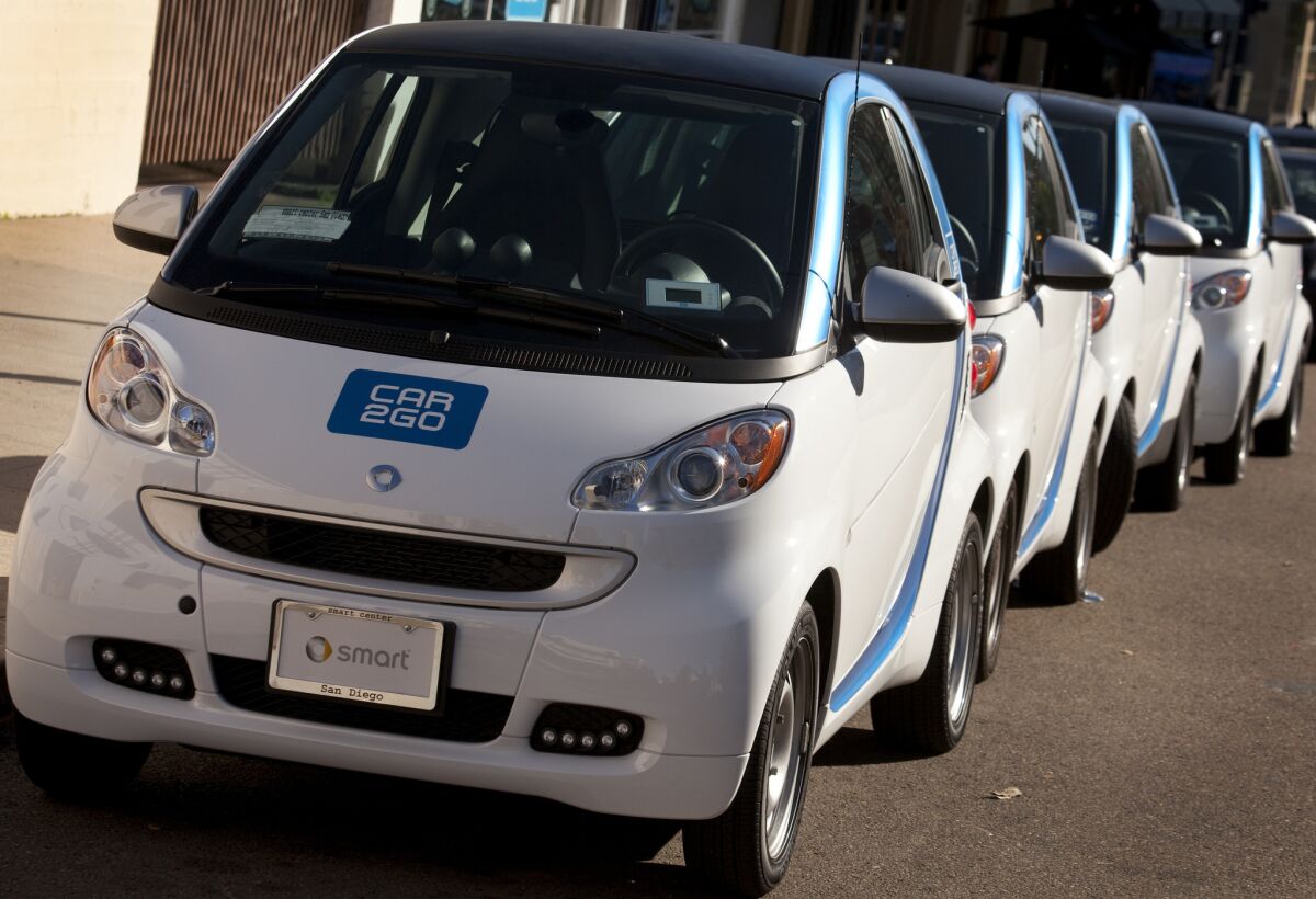 February 8, 2012-SAN DIEGO, CA| Cars at the Car2Go office on Ninth Avenue in East Village wait to be picked up.| Howard Lipin /UT San Diego). Mandatory Photo Credit HOWARD LIPIN/U-T San Diego/ZUMA PRESS, U-T San Diego