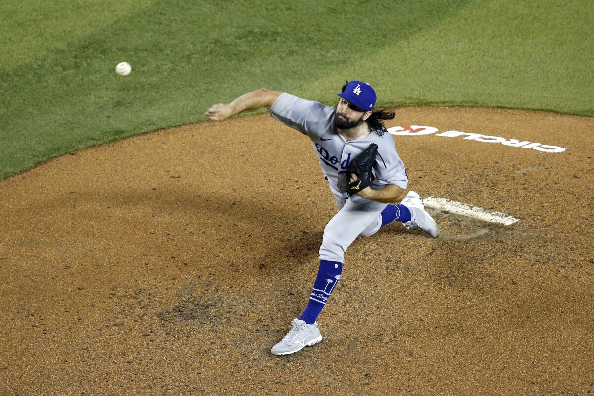 Dodgers starting pitcher Tony Gonsolin throws a pitch against the Arizona Diamondbacks.