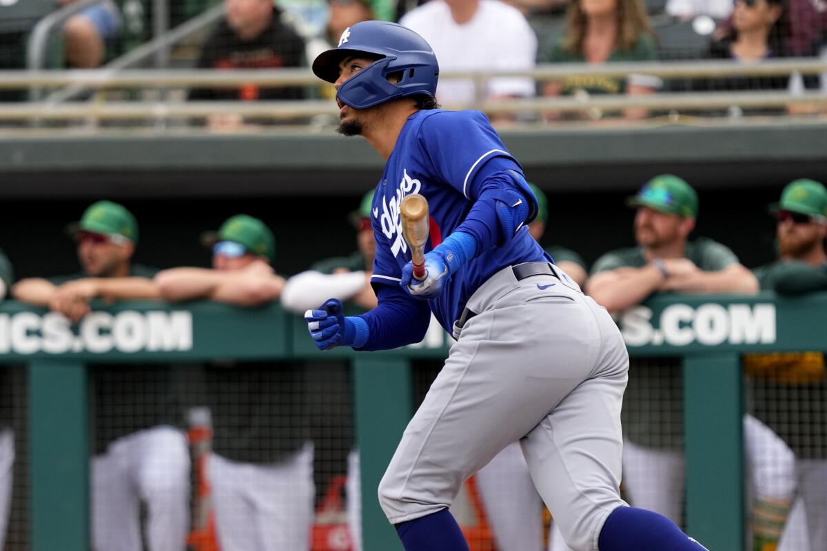 Miguel Vargas follows through on a ground-rule double for the Dodgers against the Oakland Athletics on Thursday.