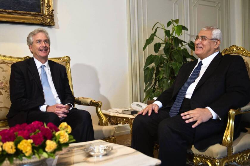U.S. Deputy Secretary of State William J. Burns, left, meets with Egypt's interim president, Adly Mahmoud Mansour, at the presidential palace in Cairo.