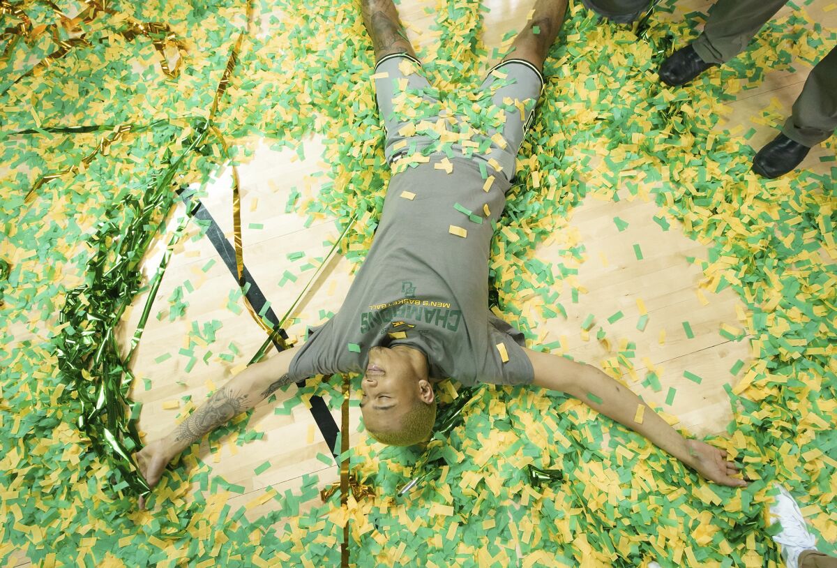 Baylor forward Jeremy Sochan celebrates a win after an NCAA college basketball game against Iowa State, Saturday, March 5, 2022, in Waco, Texas. (Chris Jones/Waco Tribune-Herald via AP)
