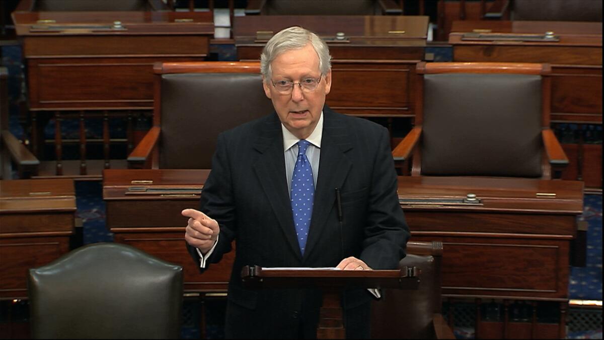 Majority Leader Mitch McConnell speaks on the Senate floor on Thursday about plans for the Trump impeachment trial.