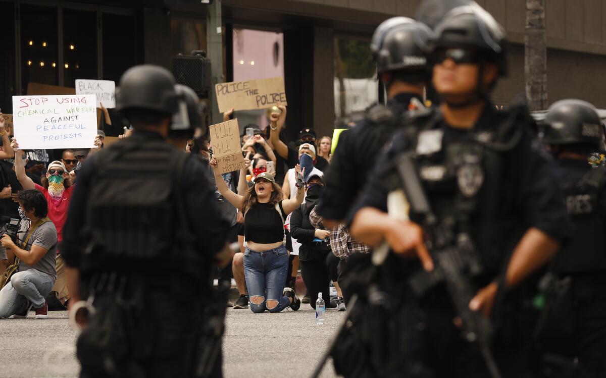 LAPD officers surround protesters on June 2 in Hollywood.