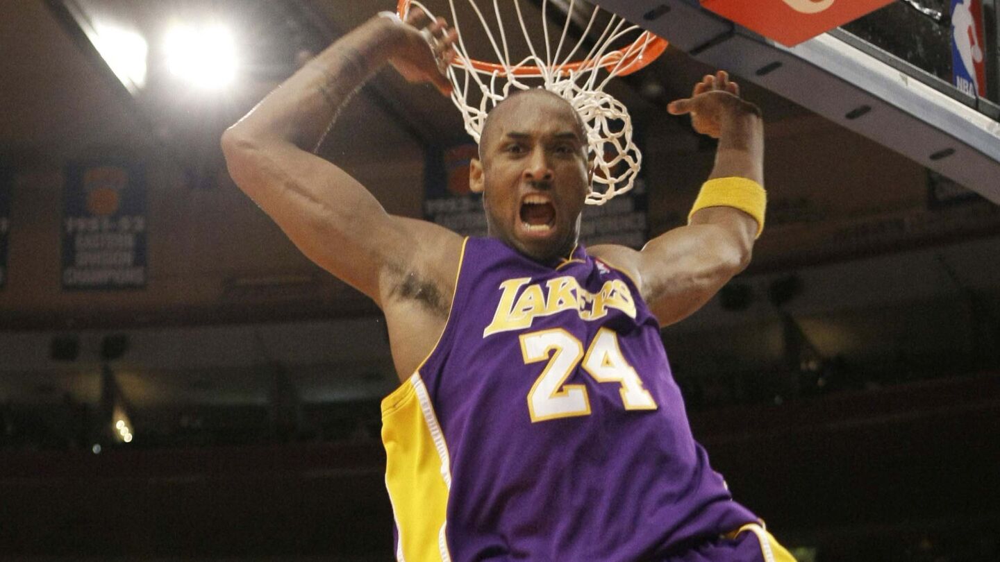 Lakers star Kobe Bryant reacts immediately after a slam dunk against the New York Knicks on Feb. 2, 2009, at Madison Square Garden. Bryant scored 61 points in the win.