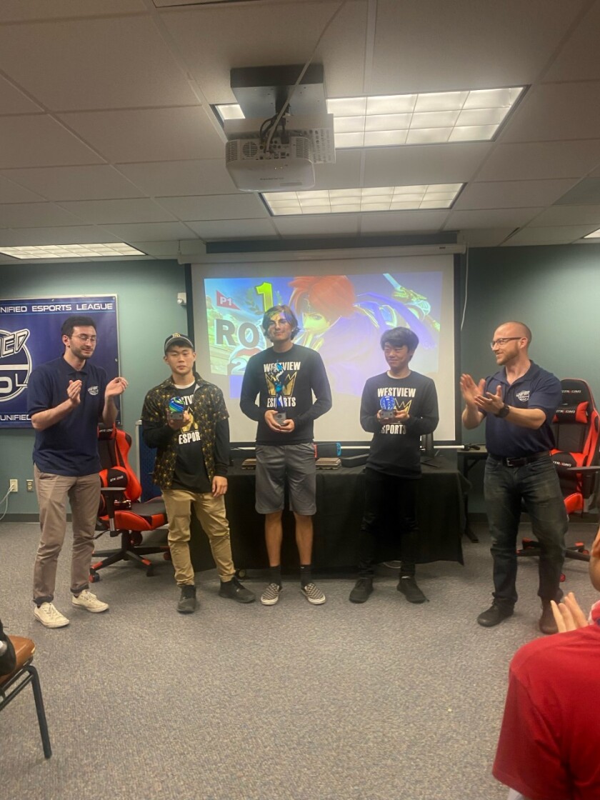 Dino Mrakovic, in center, took first place for Westview.
