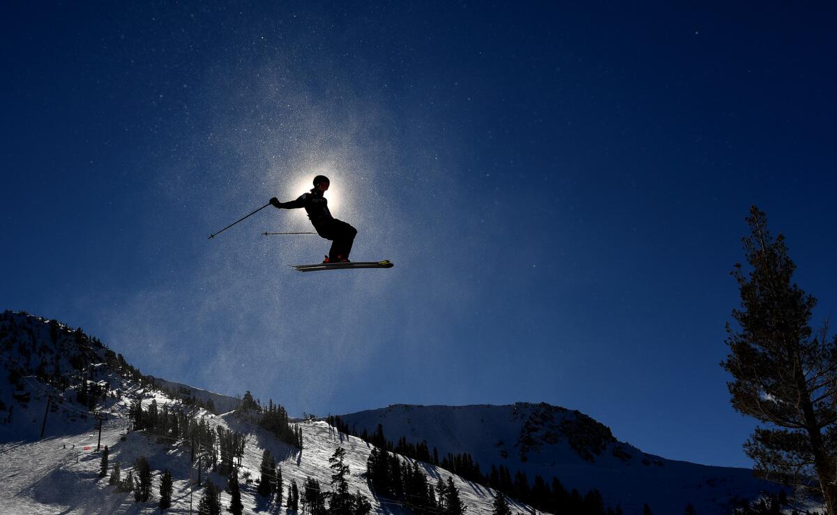 A competitor warms-up before the start of the men's slopestyle qualifier in Mammoth Mountain on Saturday. Wally Sklaij / Los Angeles Times