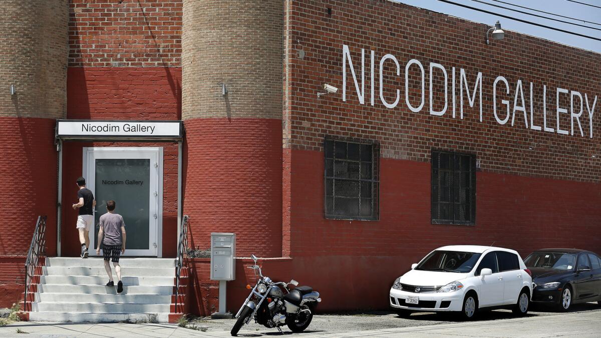 Visitors make their way into Nicodim Gallery on Anderson Street in Boyle Heights.