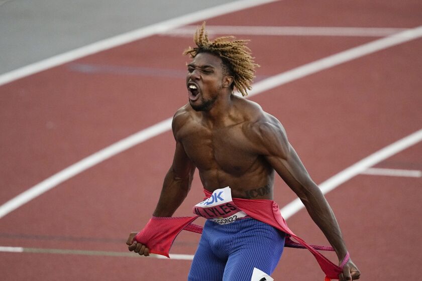 Noah Lyles, of the United States, celebrates after winning the men's 200-meter run final at the World Athletics Championships on Thursday, July 21, 2022, in Eugene, Ore. (AP Photo/Gregory Bull)