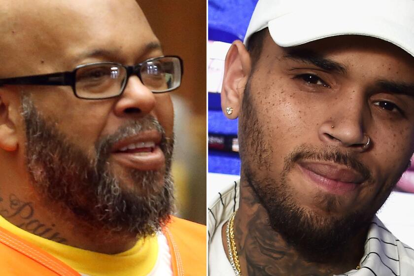 Suge Knight, left, has sued Chris Brown over a 2014 nightclub shooting in which the former music mogul was hit multiple times.