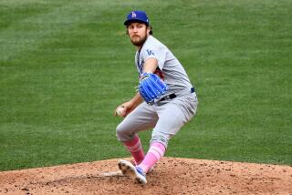 ANAHEIM, CALIFORNIA MAY 9, 2021-Dodgers pitcher Trevor Bauer throws a pitch.