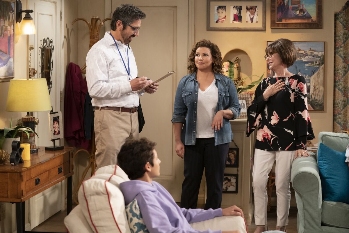From left, guest star Ray Romano as a census taker, Marcel Ruiz as Alex, Justina Machado as Penelope and Rita Moreno as Lydia in "One Day at a Time."