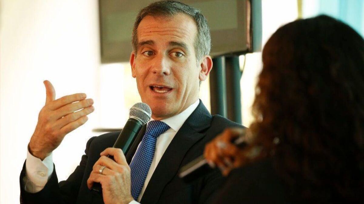 Los Angeles Mayor Eric Garcetti interviews Rhiana Gunn-Wright, leader of the nonprofit group New Consensus, just after Garcetti on Monday announced L.A.'s new sustainability plan, which he touted as the city's Green New Deal.