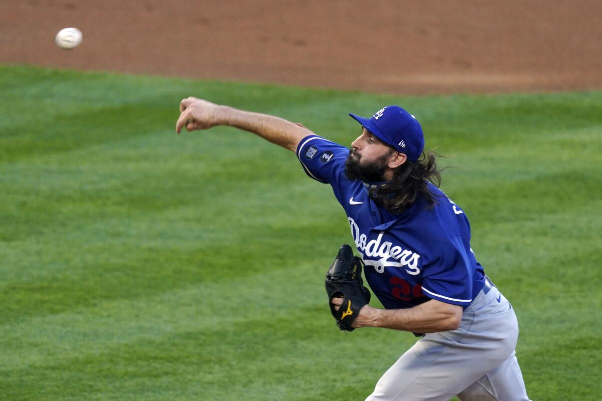 Los Angeles Dodgers starting pitcher Tony Gonsolin throws to the plate during the first inning of a spring training exhibition baseball game against the Los Angeles Angels Sunday, March 28, 2021, in Anaheim, Calif. (AP Photo/Mark J. Terrill)