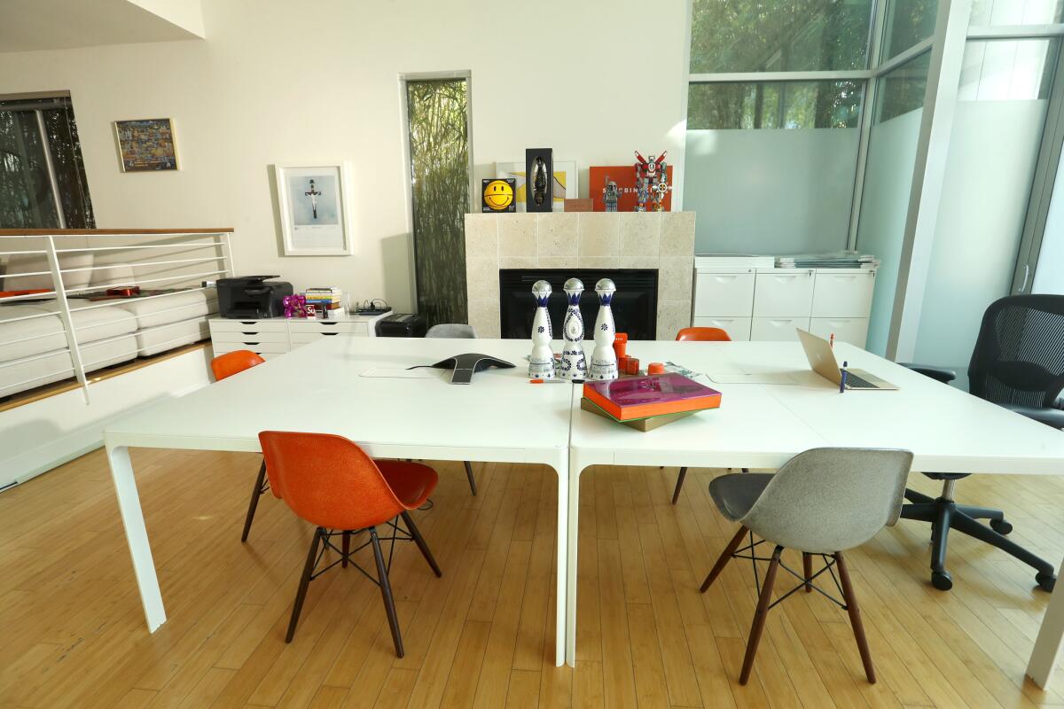 Overall, shows the conference room/meeting room, located in the entry of Will Htun's home in West Hollywood. Htun is the CEO and co-founder of Sherbinski's Premium Cannabis and Lifestyle.