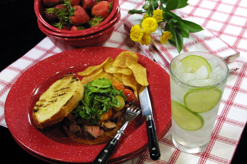 Grilled steak and roasted tomato sandwich.