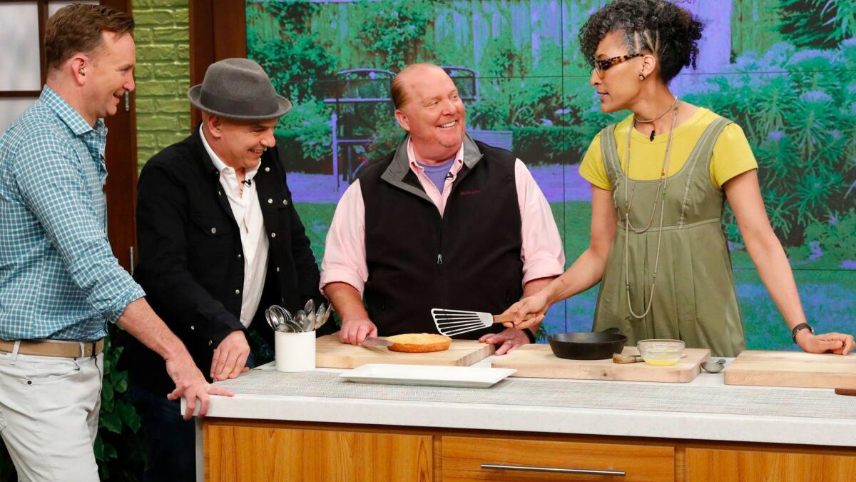 Clinton Kelly, Michael Simon, Mario Batali and Carla Hall on ABC's "The Chew" in May 2017.