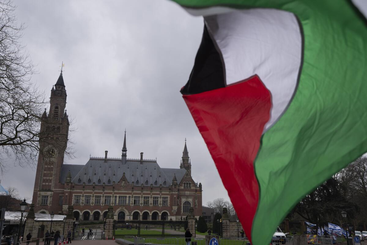 A Palestinian flag flies outside the United Nations' highest court at The Hague, Netherlands.