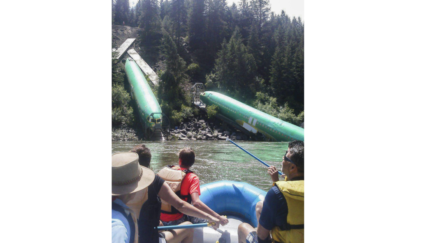 Aircraft fuselages wind up in river