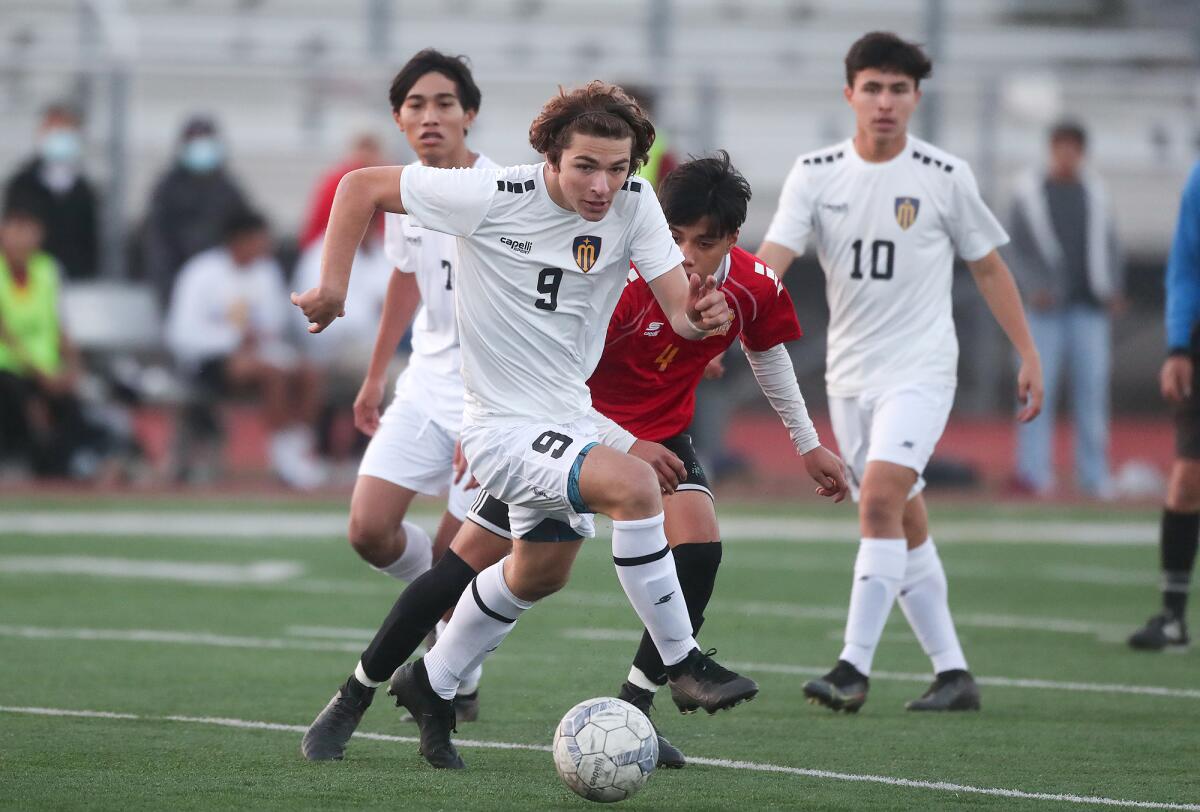 Marina forward Ted Frousiakis (9) brings the ball into position during a nonleague boys' soccer game against Ocean View.