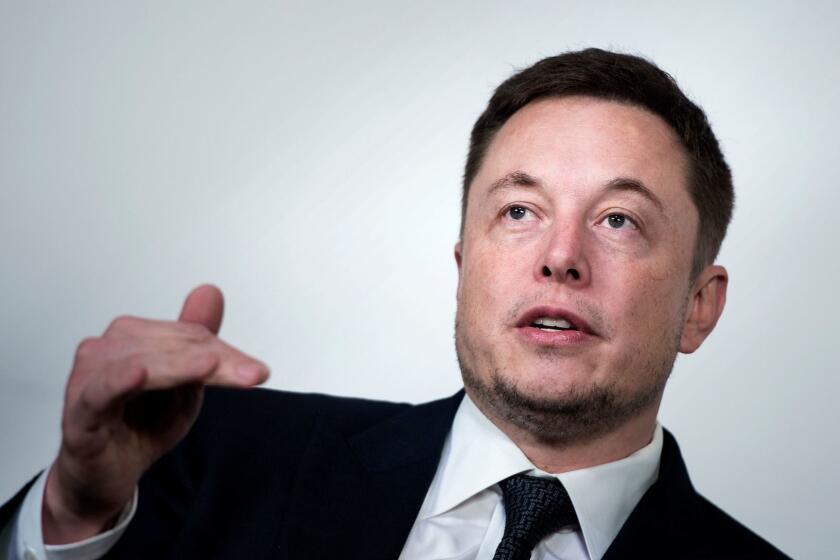 (FILES) In this file photo taken on July 19, 2017 Elon Musk, CEO of SpaceX and Tesla, speaks during the International Space Station Research and Development Conference at the Omni Shoreham Hotel in Washington, DC. An update to Tesla's Autopilot software coming in August will enable "full self-driving features" for the automaker's electric cars, chief executive Elon Musk says. Musk's comments come amid a race by automakers and tech firms to roll out fully autonomous vehicles, but also rising concerns about the safety of robotic systems.Musk said the updated "Version 9" coming in August 2018 would help address a number of issues. "To date, Autopilot resources have rightly focused entirely on safety. With V9, we will begin to enable full self-driving features," he said. / AFP PHOTO / Brendan SmialowskiBRENDAN SMIALOWSKI/AFP/Getty Images ** OUTS - ELSENT, FPG, CM - OUTS * NM, PH, VA if sourced by CT, LA or MoD **