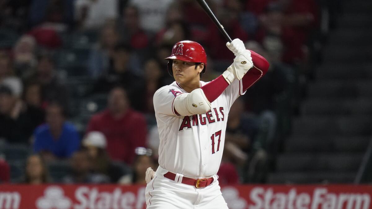 Angels designated hitter Shohei Ohtani bats during a game.