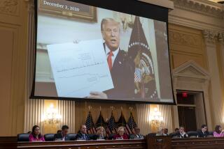 WASHINGTON, DC - JUNE 13: A video of former President Donald Trump is displayed on a screen during a House Select Committee to Investigate the January 6th hearing in the Cannon House Office Building on Monday, June 13, 2022 in Washington, DC. The bipartisan Select Committee to Investigate the January 6th Attack On the United States Capitol has spent nearly a year conducting more than 1,000 interviews, reviewed more than 140,000 documents day of the attack. (Kent Nishimura / Los Angeles Times)