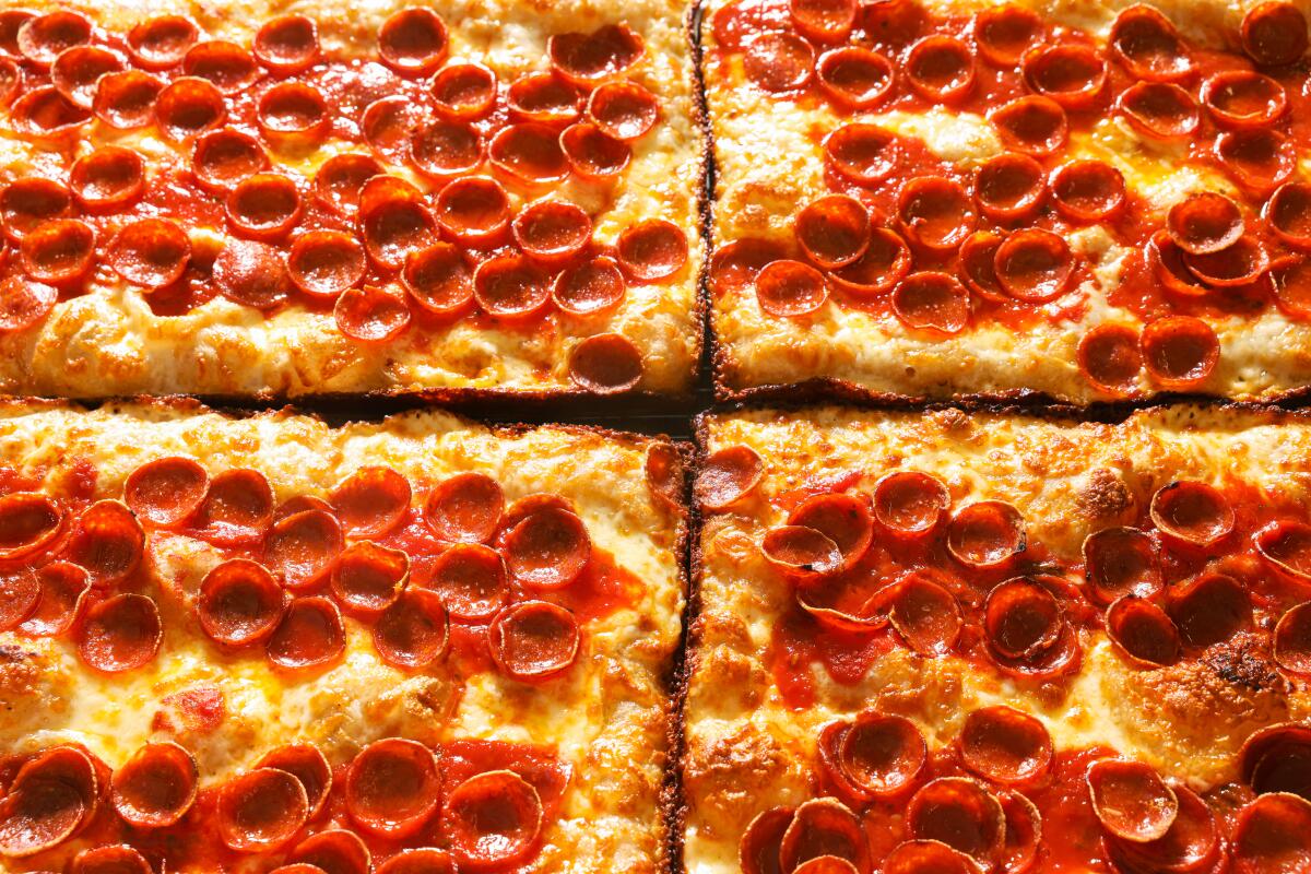 Los Angeles, CA - August 05: Freshly baked pepperoni pizzas cool at Quarters Sheets on Friday, Aug. 5, 2022 in Los Angeles, CA. (Dania Maxwell / Los Angeles Times)