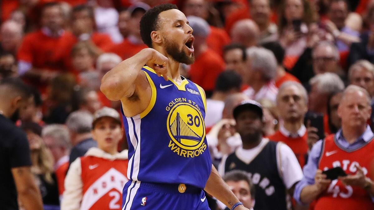 Stephen Curry of Golden State reacts to the action during Game 5 of the NBA Finals in Toronto on Monday.