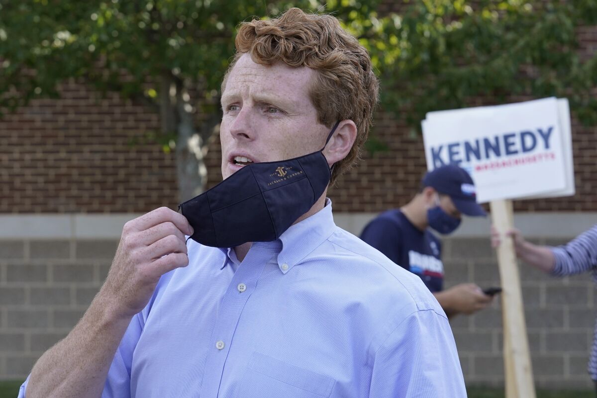 Rep. Joseph P. Kennedy III (D-Mass.) talks to reporters Tuesday at a campaign stop in Boston.