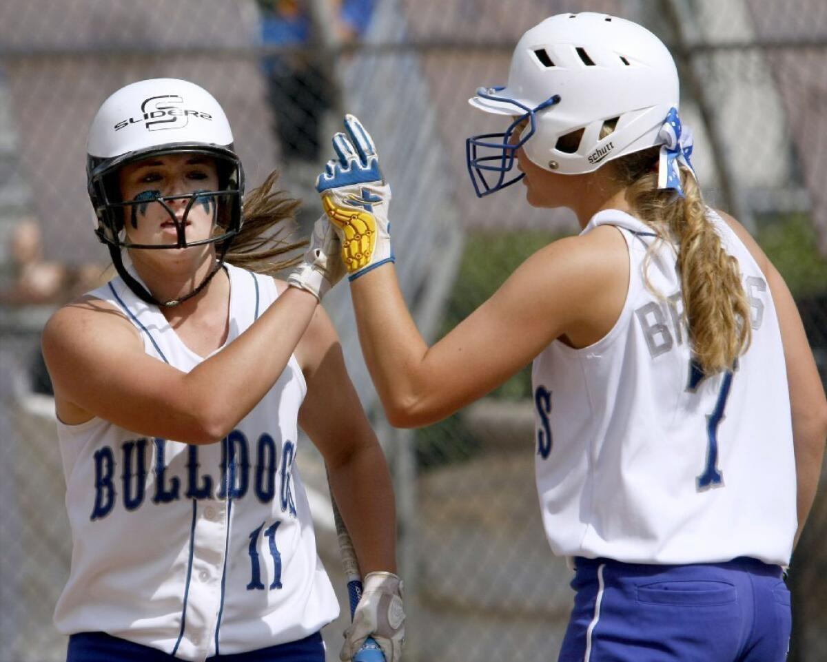 Burbank High's Katie Hooper blasted a three-home home run over the left-field fence in the bottom of the sixth inning. Sophomore pitcher Caitlyn Brooks shut it down in the seventh inning with her 13th, 14th and 15th strikeouts, giving the Bulldogs a 7-2 victory at McCambridge Park.