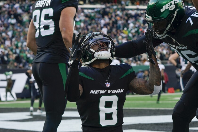 New York Jets wide receiver Elijah Moore celebrates after scoring a touchdown during the first half of an NFL football game against the Philadelphia Eagles, Sunday, Dec. 5, 2021, in East Rutherford, N.J. (AP Photo/Seth Wenig)