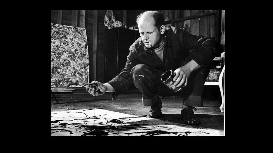 Jackson Pollock paints with the drip technique in this undated photo.