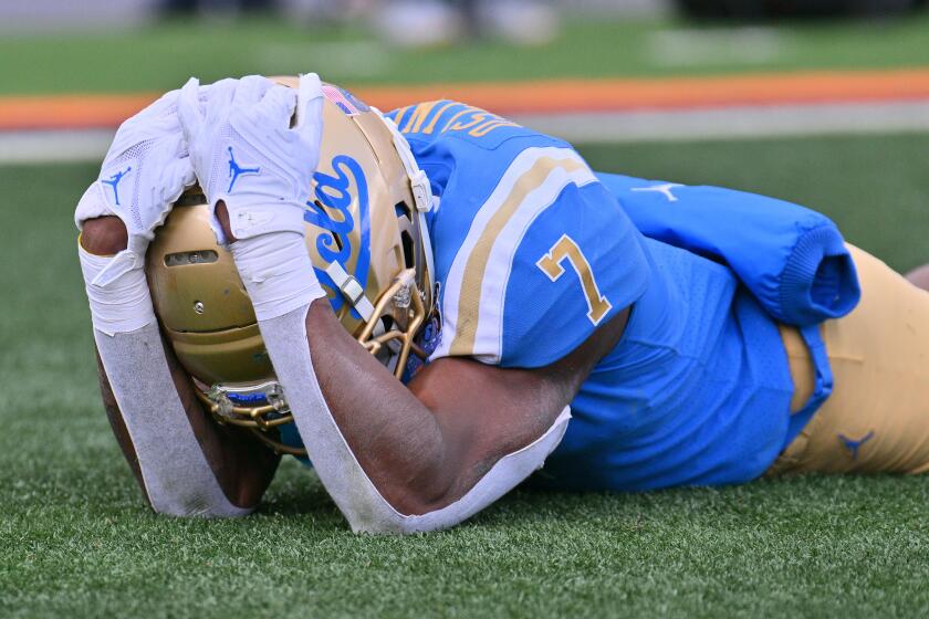 EL PASO, TEXAS - DECEMBER 30: Defensive back Mo Osling III #7 of the UCLA Bruins reacts after dropping.