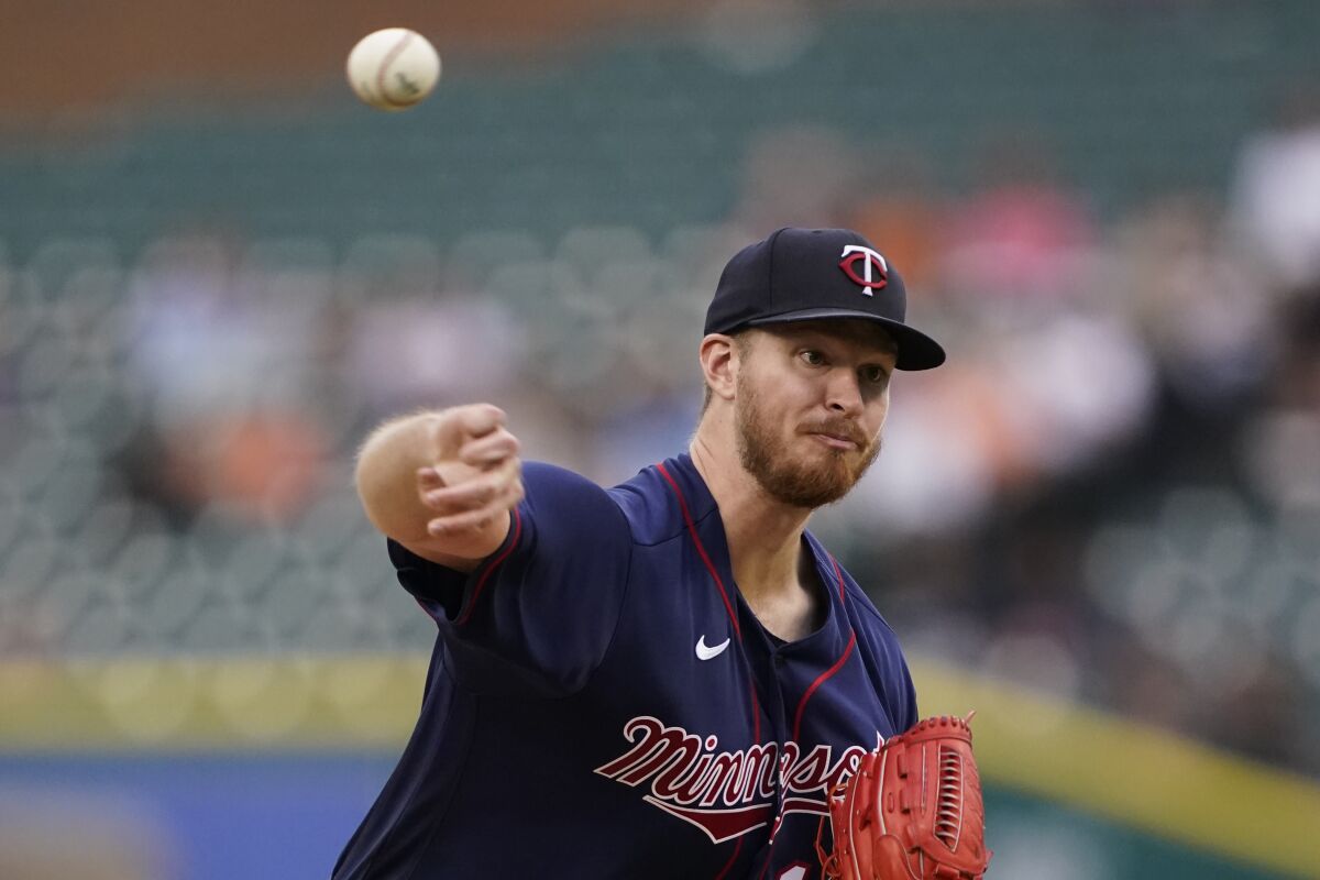 Minnesota Twins starting pitcher Bailey Ober throws during the first inning of a baseball game against the Detroit Tigers, Wednesday, June 1, 2022, in Detroit. (AP Photo/Carlos Osorio)