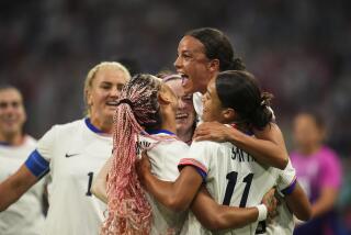 U.S. players celebrate after Sophia Smith scored during a win over Germany during a 2024 Olympics group stage match 