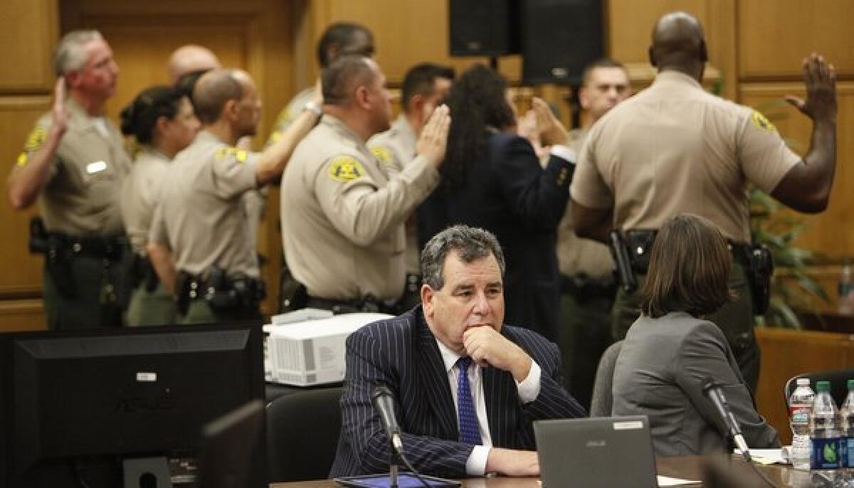 Michael Jackson family attorney Brian Panish sits in court as bailiffs are sworn in to protect jury.