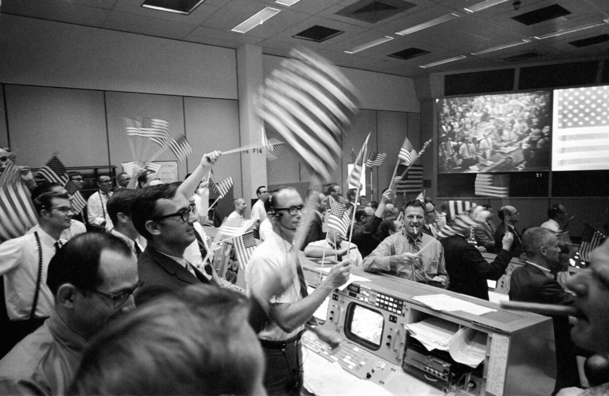 A celebration at NASA's Mission Control Center in Houston after Apollo 11 returned to Earth on July 24, 1969.