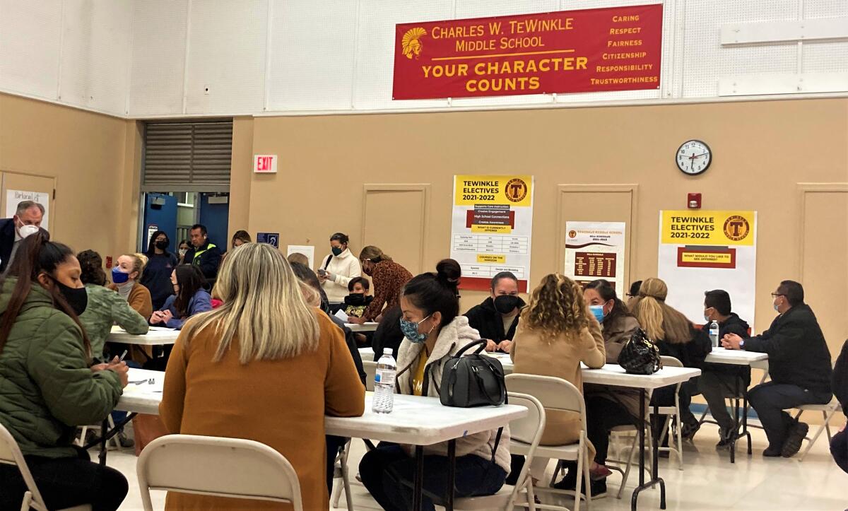 Parents and school officials grappled in a forum Tuesday over the scarcity of elective courses at TeWinkle Middle School.