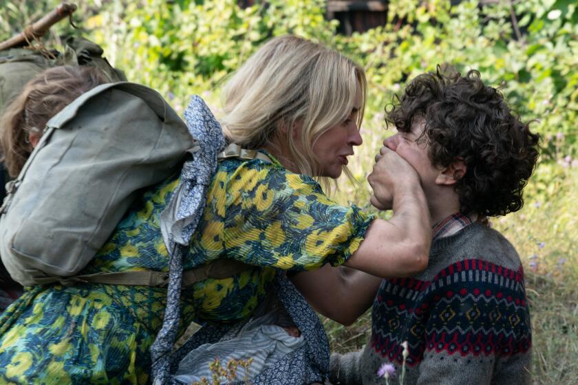 Emily Blunt and Noah Jupe in the movie "A Quiet Place Part II."