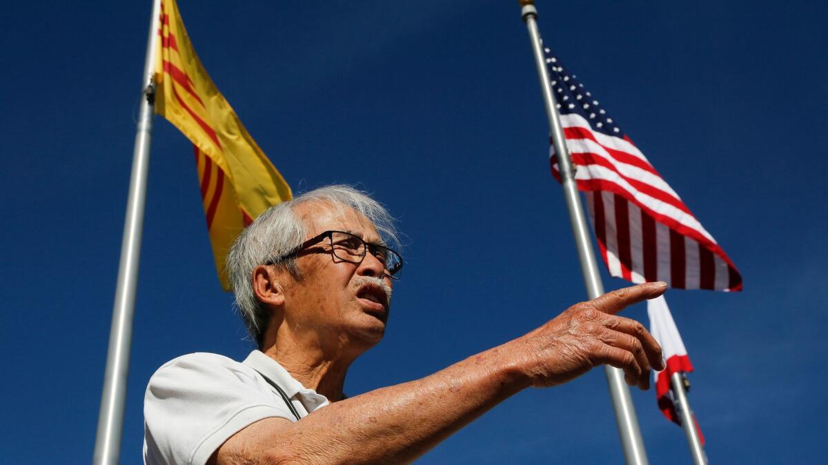 Steve Tran, 80, of Garden Grove, is a mechanical engineer who left Vietnam in 1975 with his wife and children. He supports President Trump's travel ban policy, along with his son. His 14-year-old grandson does not.