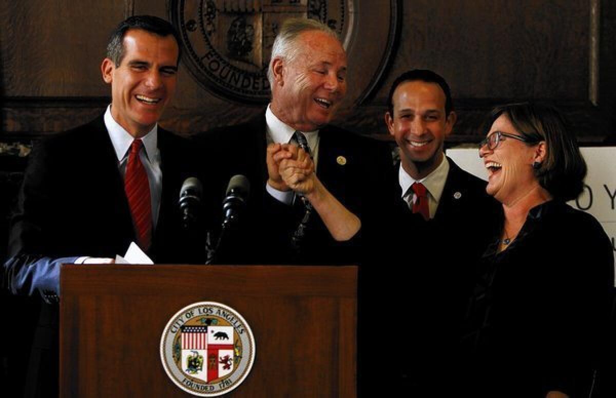Los Angeles Mayor Eric Garcetti, left, City Council members Tom LaBonge and Mitch Englander and U.S. Geological Survey seismologist Lucy Jones take part in a City Hall news conference to announce an earthquake safety initiative.