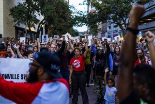 JACKSONVILLE, FL - AUG, 2023: People march to honor the victims of a deadly shooting in Jacksonville, Florida on August 28, 2023. Photo by Saul Martinez for The Washington Post via Getty Images
