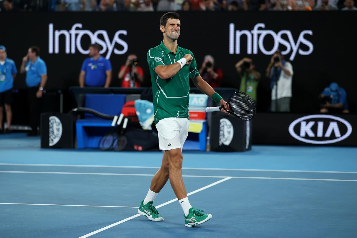 Novak Djokovic celebrates Jan. 30 after defeating Roger Federer in an Australian Open semifinal.