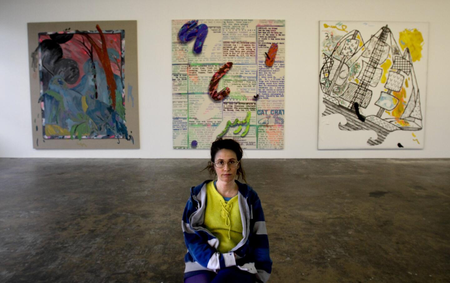 Passionate, polemical, powerful performances in paint: Laura Owens http://lat.ms/1cnguVR & Lari Pittman http://lat.ms/1gX387b #Top10art In the photo above: Laura Owens in the massive studio/exhibition space showing her 12 untitled paintings.