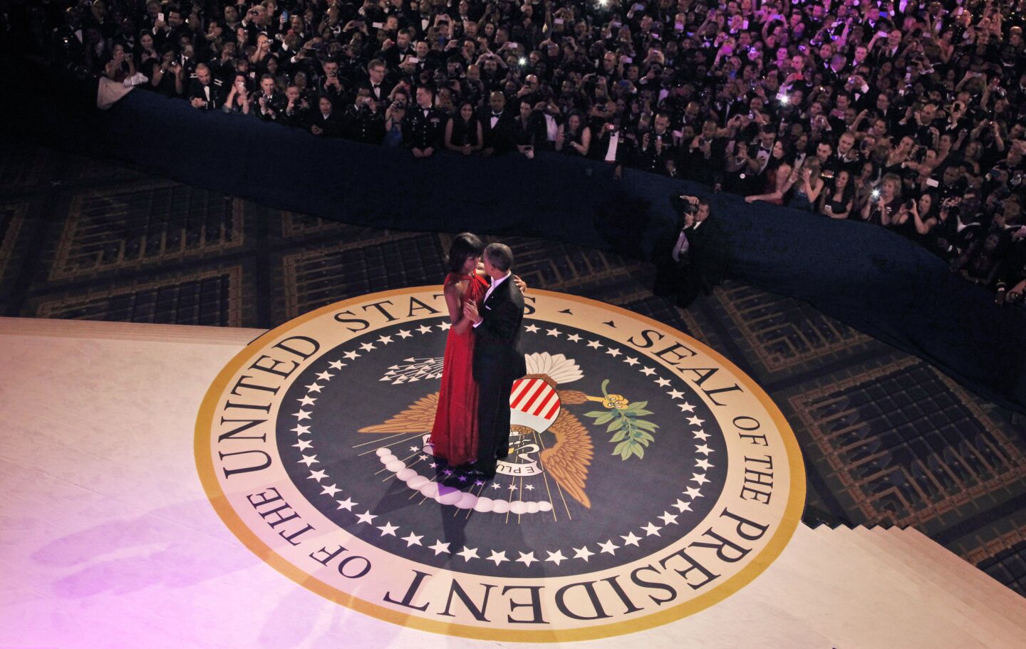 President Obama and First Lady Michelle Obama take to the dance floor during the Commander-in-Chief Inaugural Ball at the Washington Convention Center.