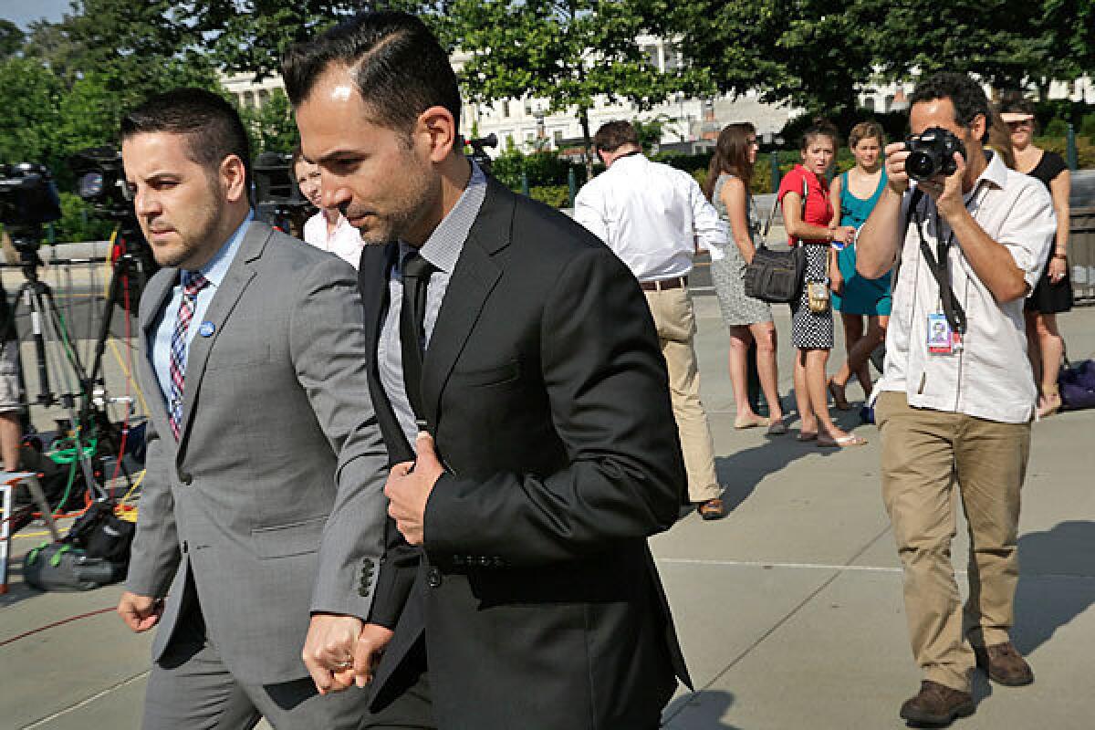 Proposition 8 plaintiffs Jeffrey Zarrillo, left, and Paul Katami arrive at the Supreme Court on Thursday.